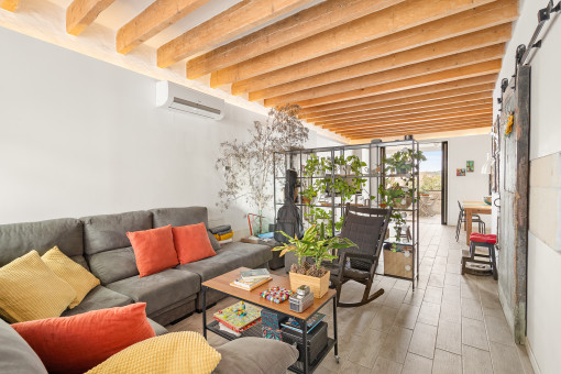 Beautiful living area with wooden ceiling beams